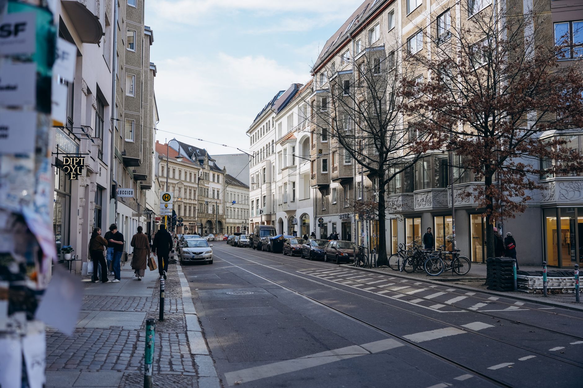 Explore a picturesque Berlin street showcasing historic architecture, perfect for travel enthusiasts.